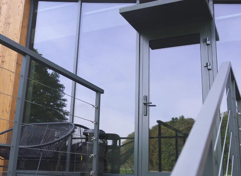 Custom bi-fold panoramic glass doors installed in a premium backyard project in Los Angeles by Dream Patios LA.