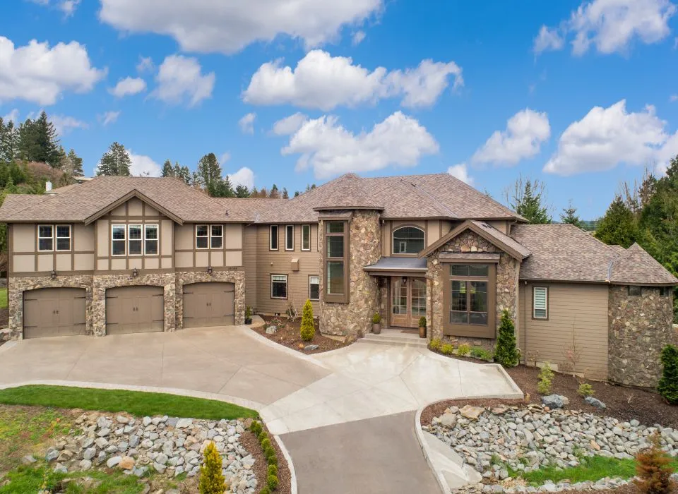 Custom stone steps and front porch renovation enhancing the entryway of a Los Angeles home by Dream Patios LA.
