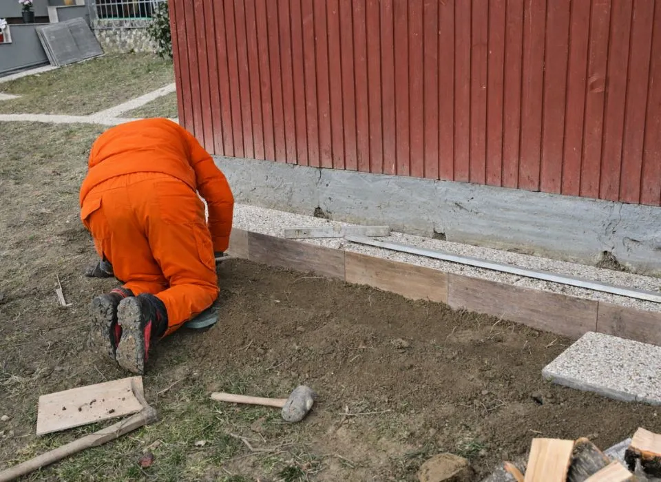 Integrated LED lighting system in a sleek black bioclimatic patio cover for a luxury backyard in Los Angeles by Dream Patios LA.