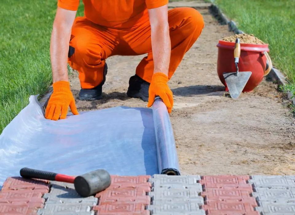 Custom slate stepping stone pathway integrated into a luxury garden design in Los Angeles by Dream Patios LA.