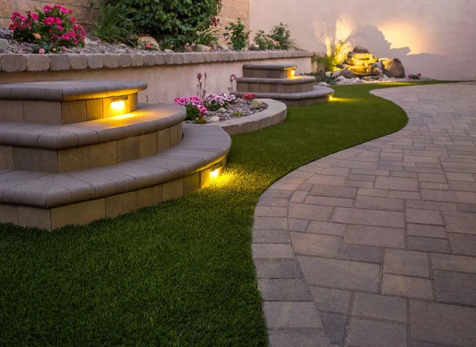 Professional installation of a durable stone sitting wall structure before lighting integration in Los Angeles by Dream Patios LA.